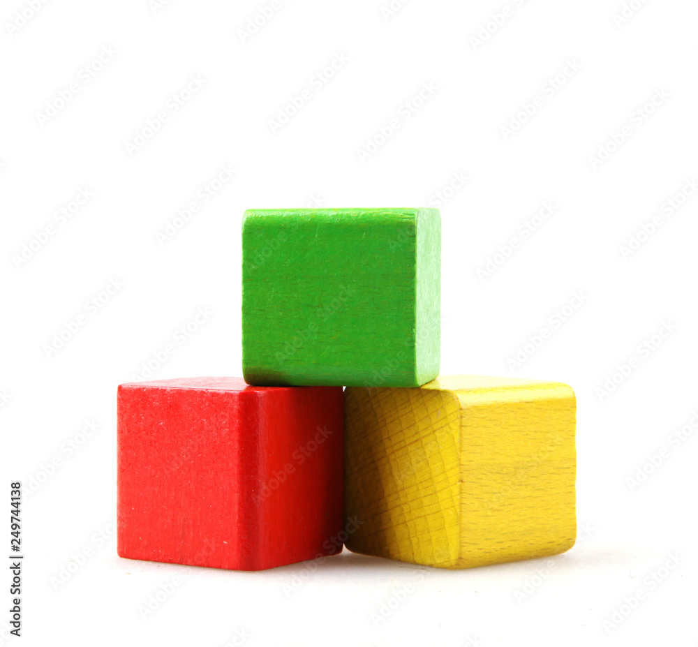 Studio Shot Of Colorful Toy Blocks Against White Background
