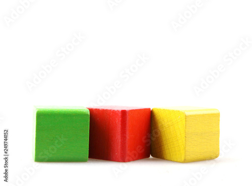 Studio Shot Of Colorful Toy Blocks Against White Background