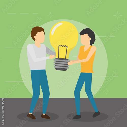 man and woman holding bulb creativity