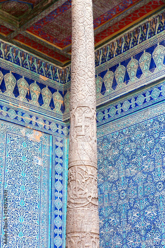  fragment of an ancient carving  on a column . Khiva, Uzbekistan..