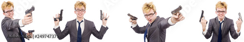 Young man with handgun isolated on white 