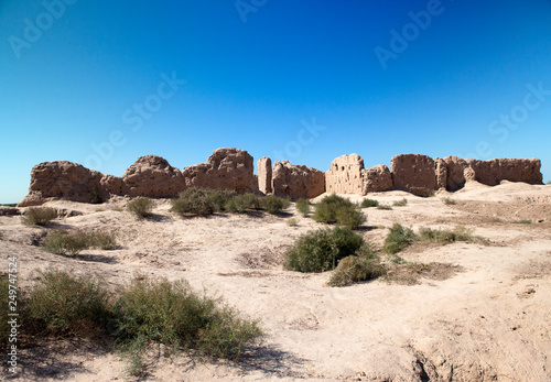 ruins of fortress Kyzylkala (Red Town) -trading settlement on the Silk Road (10-13 century), ancient Khorezm, in the Kyzylkum desert in Uzbekistan photo