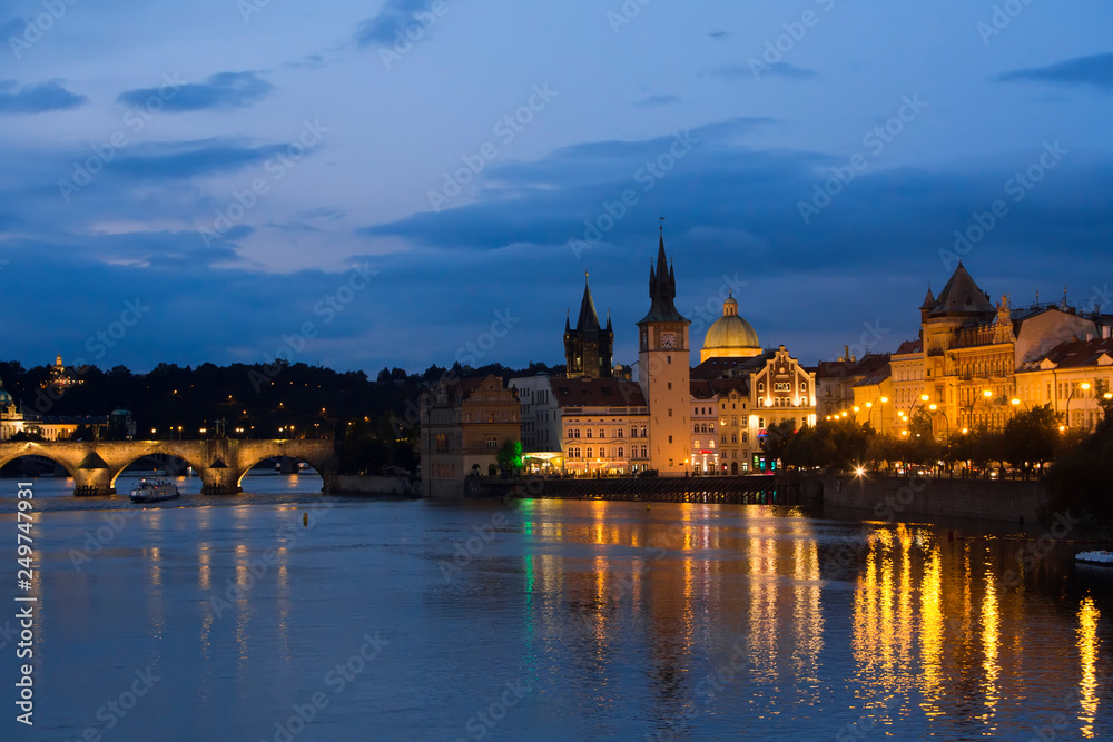 Beautiful Cityscape of Prague at night with Charles Bridge(Karluv Most)  over Vltava river