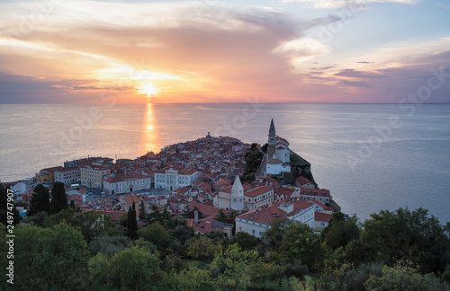 Panoramic view of the old town of Piran/Pirano at the sunset, from the medieval old town walls