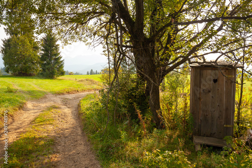 Obraz na płótnie Camping wooden outhouse w salonie