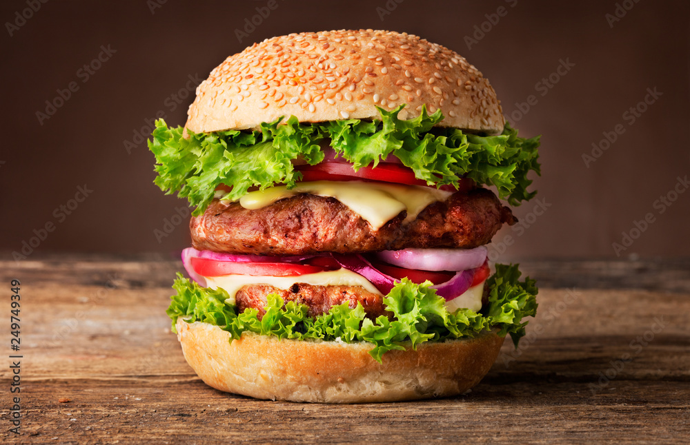 big burger on wooden background big burger on wooden background