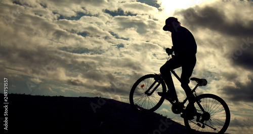 Silhouette of Mountain bike.Sport and healthy life.Extreme sports.Mountain bicycle and man.Life style outdoor extreme sport