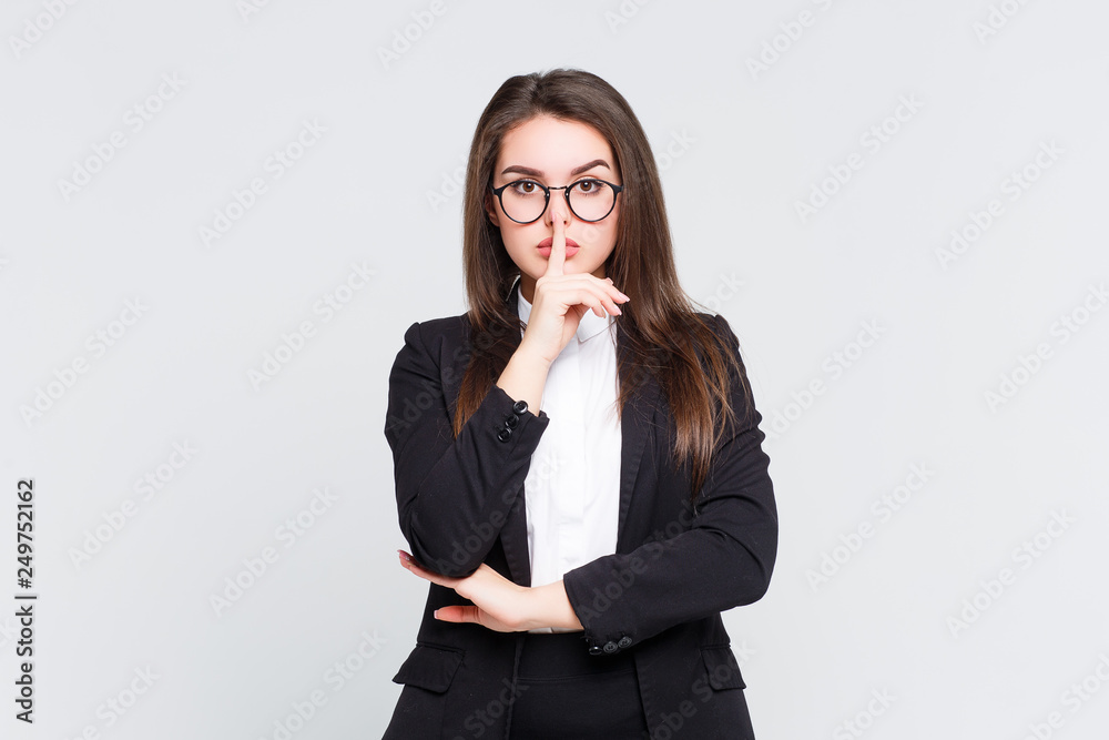 Beautiful amazed female model dressed at black suit ,isolated over white background! Beautiful amazed female model dressed at black suit ,isolated over white background!