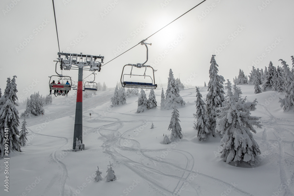 Ski chairlift on mountain in the winter