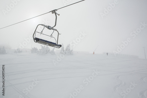 Ski chairlift on mountain in the winter