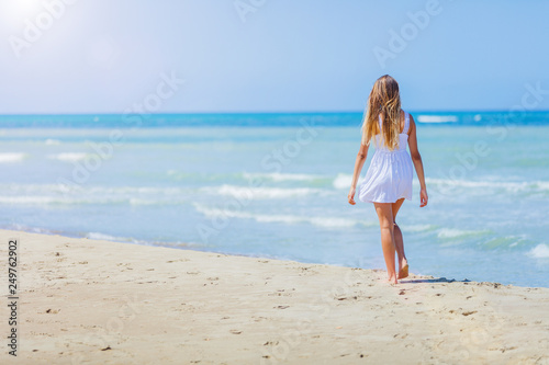 Happy Girl having fun on tropical beach