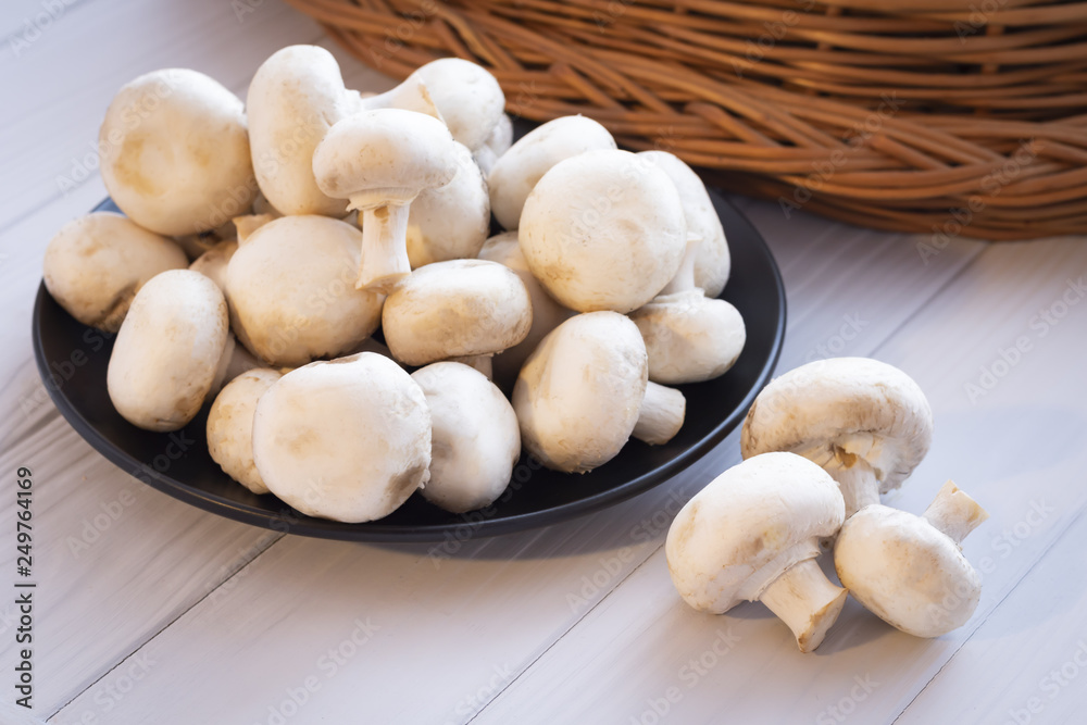fresh mushrooms on a wooden board fresh mushrooms on a wooden board