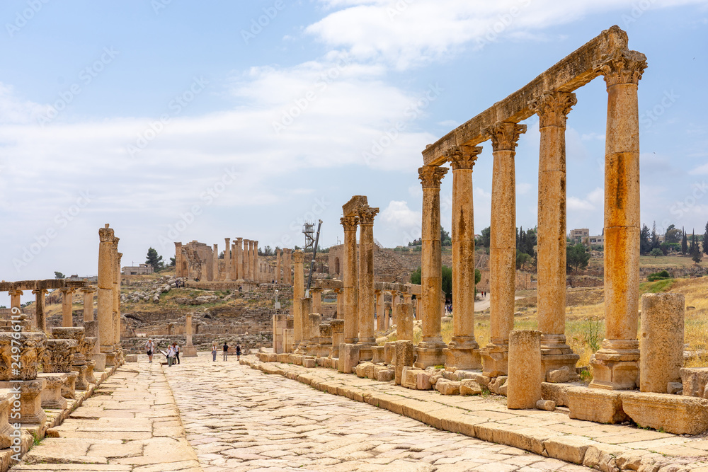 Cardo Maximus, main colonnaded street of the Roman city of Jerash, Jordan. Zeuss temple on background
