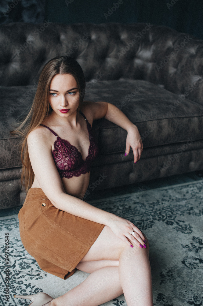 Beautiful woman in a skirt in a beautiful interior. Toning Beautiful woman in a skirt in a beautiful interior. Toning