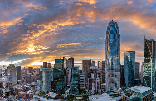 Sunset over San Francisco creates a orange and red halo over the city