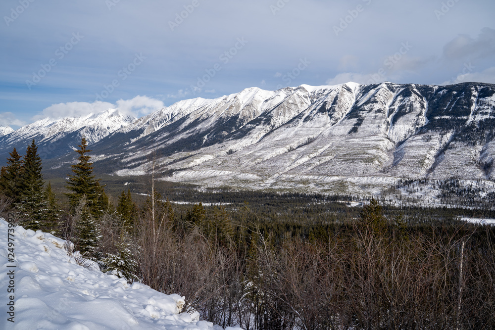 Kootenay Crossing scenic viewpoint roadside pullout in winter provides beautiful views of the Canadian Rockies