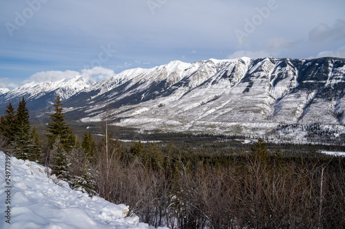 Kootenay Crossing scenic viewpoint roadside pullout in winter provides beautiful views of the Canadian Rockies