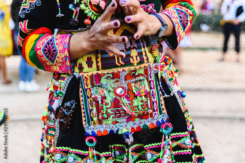 Detail of the colorful embroidery of a typical costume from the Andean folklore of Bolivia to dance the Tinku.