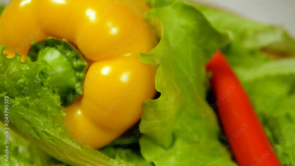 Fresh Organic Vegetables rotating on wooden table. Pepper, salad and other. Fresh Organic Vegetables rotating on wooden table. Pepper, salad and other.