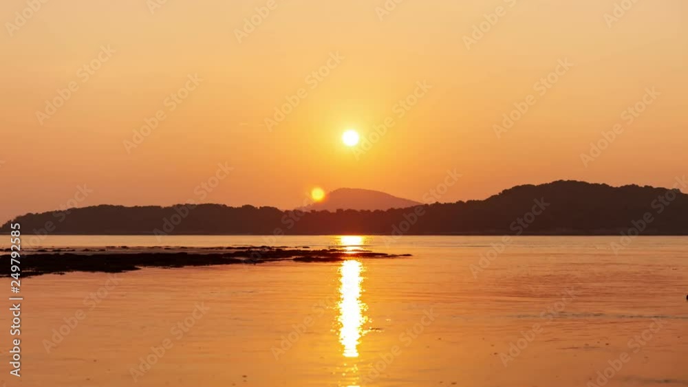 4k Timelapse of beautiful light sunrise scenery or sunset sky with reflection over sea and clouds flowing in the sky 4k Timelapse of beautiful light sunrise scenery or sunset sky with reflection over sea and clouds flowing in the sky