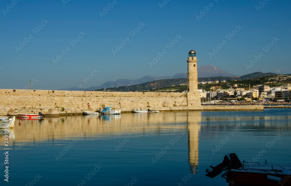 Old lighthouse at port of Rethymno town, Crete island, Greece