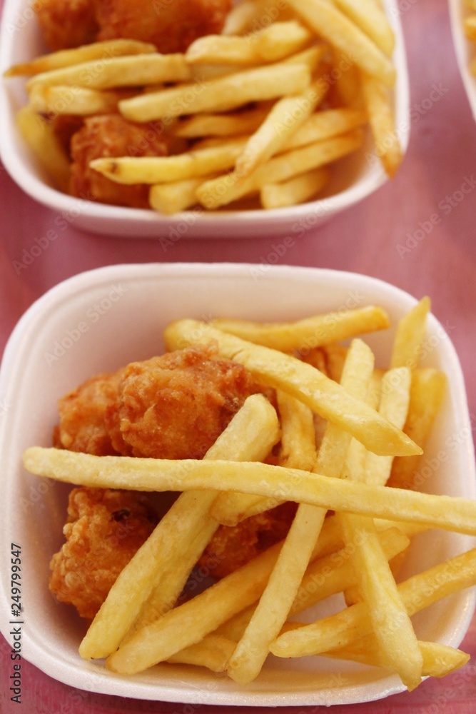 French fries and fried chicken nuggets delicious French fries and fried chicken nuggets delicious