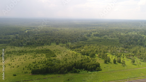 panoramic picture of green valley and forest made by dron from high flight