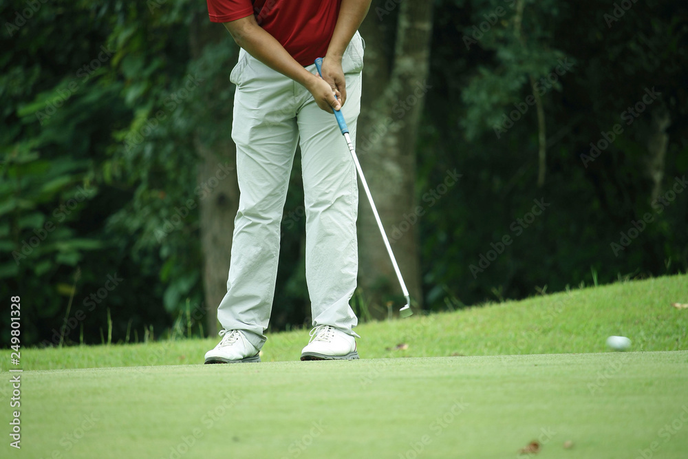 Fototapeta premium Golfers are putting golf in the evening golf course golf backglound in Thailand