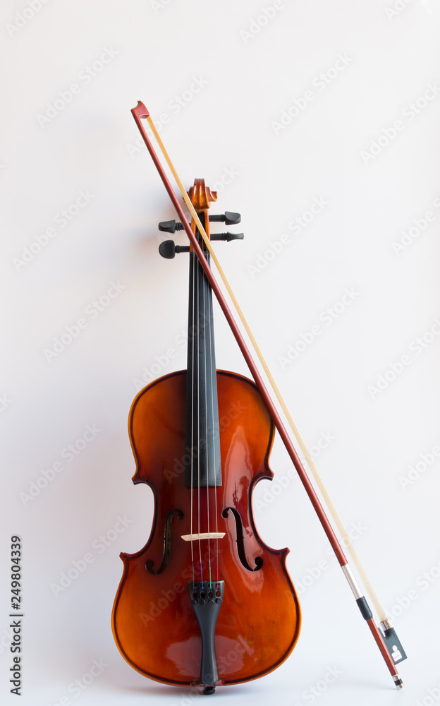 Fototapeta premium Violin in white background with bow