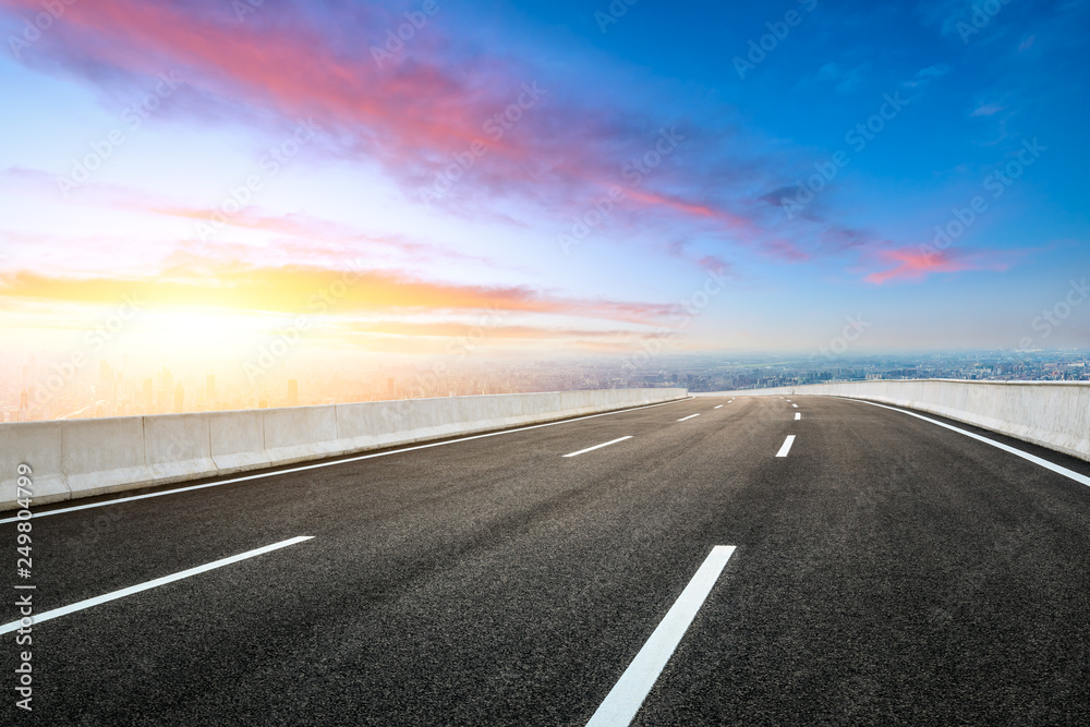 Empty asphalt road and modern city skyline with buildings in Shanghai,China