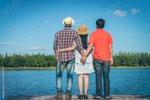 Young couple With another man