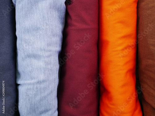 stack of shirts background,silk cloth texture