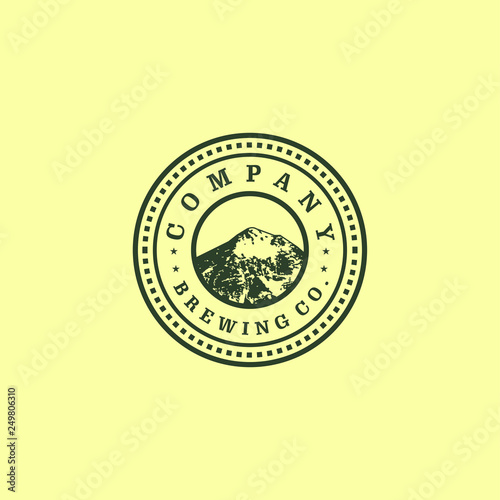 A mountain logo design template. Awesome mountain with circle logo. A mountain with circle logotype.