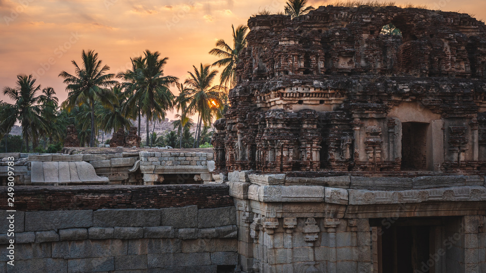 Fototapeta premium achyutaraya temple in hampi karnakata india at sunrise with cloudy and colorfull sky