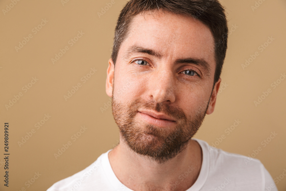 Close up portrait of a smiling young man Close up portrait of a smiling young man
