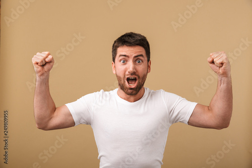 Portrait of a cheerful young man standing