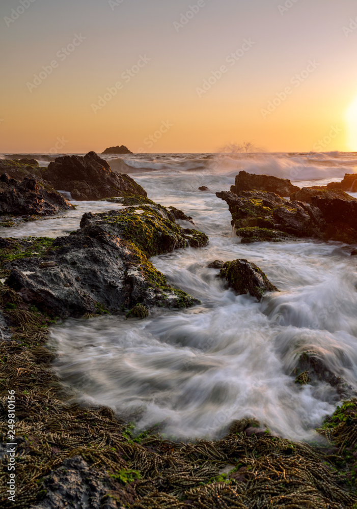 water movement over rocks at sunrise