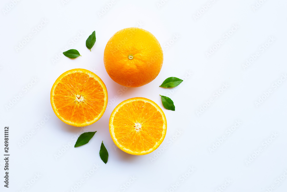 High vitamin C. Fresh orange citrus fruit with leaves isolated on white High vitamin C. Fresh orange citrus fruit with leaves isolated on white