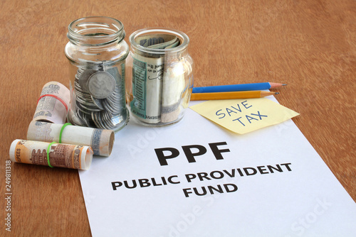 Investment of Indian rupees in public provident fund (ppf), a low-risk investment option, for saving tax, concept.
