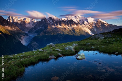 Colorful summer view of the Mont Blanc (Monte Bianco) on background, Chamonix location. Beautiful outdoor scene in Vallon de Berard Nature Reserve, Aiguilles Rouges, Graian Alps, France, Europe
