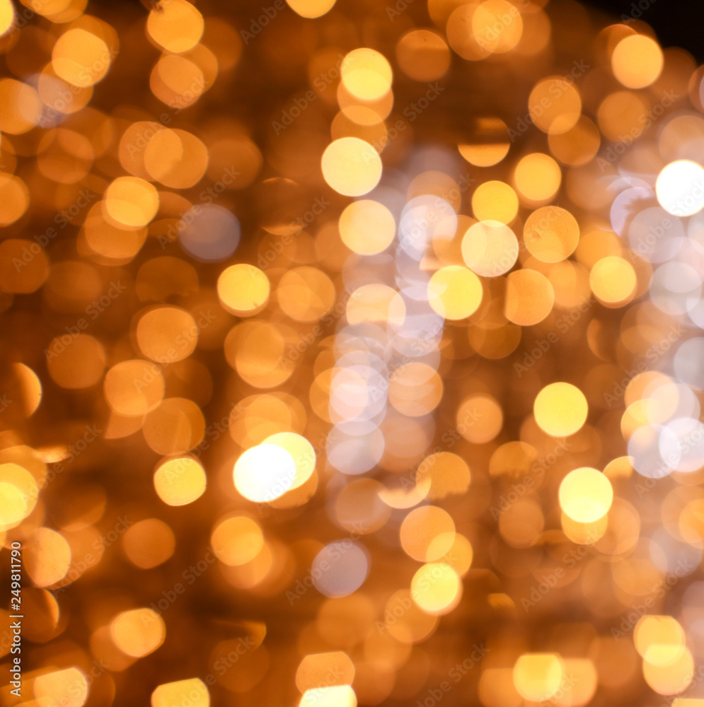 Golden bokeh lights as abstract background Golden bokeh lights as abstract background