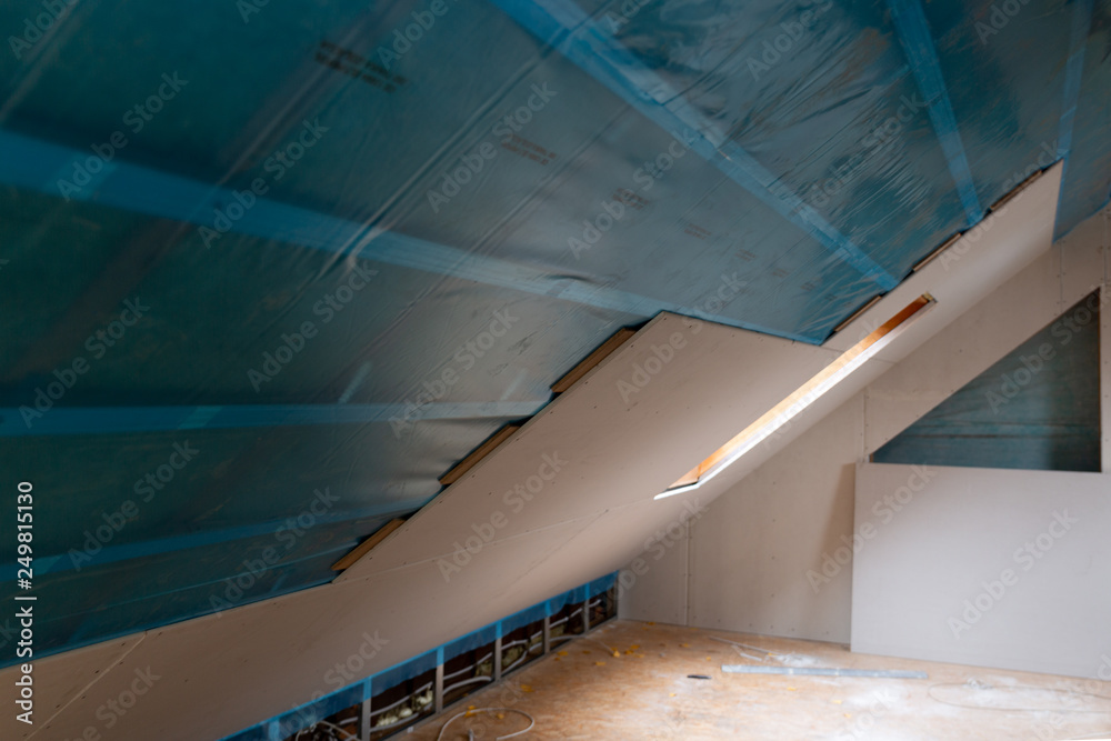 House attic insulation and renovation. Drywall construction - obrazy, fototapety, plakaty 