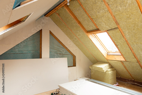 House attic insulation and renovation. Drywall construction