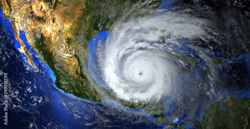 hurricane approaching the American continent visible above the Earth, a view from the satellite. Elements of this image furnished by NASA. photo