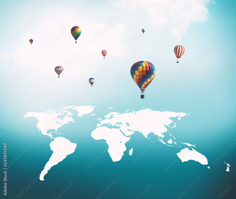 Fototapeta premium Balloons flying over world map.