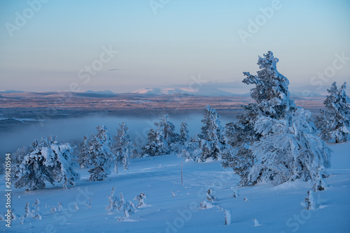 Billede på lærred Winter landscape scene in Levi ski resort with Pallas mountains in the backgroun