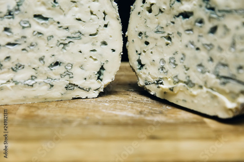 Mild blue Auvergne cheese Fourme d’Ambert from France photo