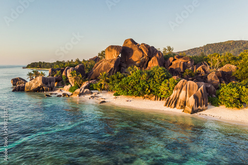 Seychelles Beach with Rocks at Sunset
