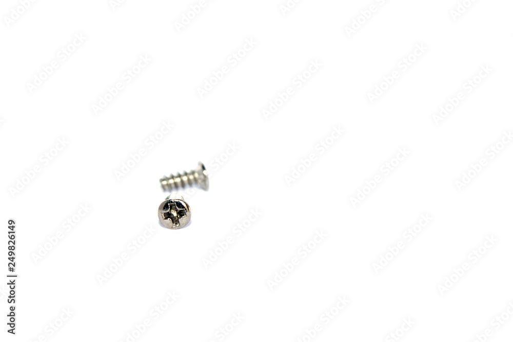 two small screws isolated on white background two small screws isolated on white background