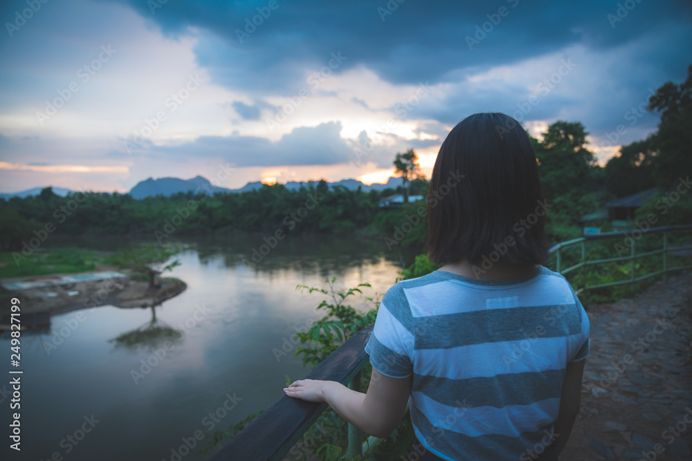 Happy young cute Asian Japanese girl hipster backpack  women travelling looking at beautiful sky mountains scenery views 